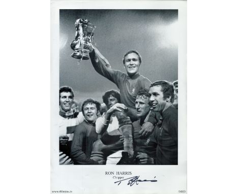 Ron Chopper Harris signed 16x12 inch black and white print pictured celebrating with the FA cup with his Chelsea teammates. G