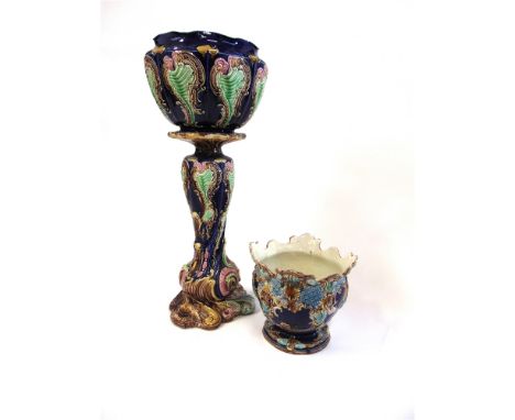 A VICTORIAN CERAMIC JARDINIERE ON STAND  86cm high, together with another jardiniere
