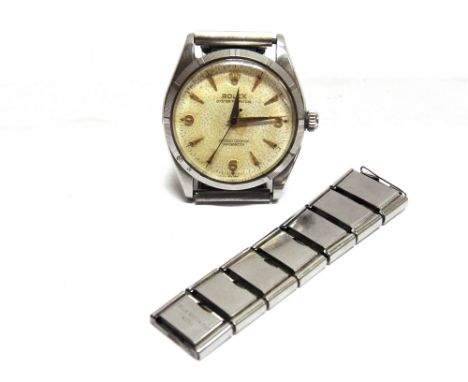 ROLEX OYSTER PERPETUAL, A GENTLEMANS STAINLESS STEEL WRISTWATCH  the off white dial with gilt daggers, Arabic quarters and ha