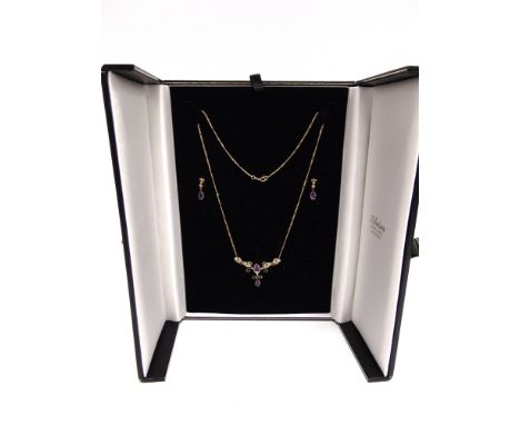A 9 CARAT GOLD AMETHYST AND SEED PEARL EDWARDIAN STYLE NECKLACE  with similar drop earrings; 5.1g gross, cased 