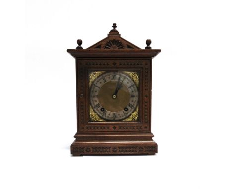 A 19TH CENTURY OAK CASED MANTLE CLOCK  the 8-day movement stamped 'W & H Sch' for Winterhalder & Hoffmeier, 21cm wide 15cm de