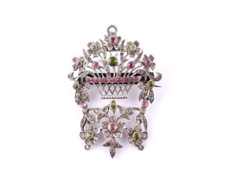 
	
		AN EARLY 20TH CENTURY SILVER AND PASTE GIARDINETTO BROOCH/PENDANT
		The pierced flower basket with white, pink and green
