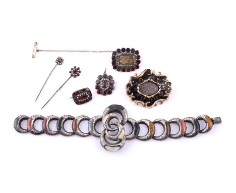 
	
		A COLLECTION OF ANTIQUE JEWELLERY
		To include an early Victorian mourning brooch, the central oval hairwork panel with 