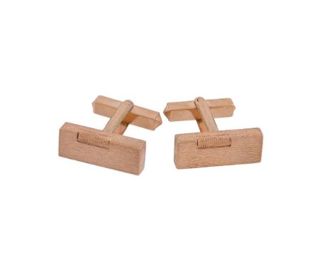 
	
		HOUSE OF LAWRAIN, A PAIR OF SILVER GILT LIGHTER CUFFLINKS 
		LONDON 1975
		The textured lighter shaped terminals to bars