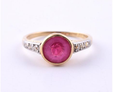 
	
		AN EARLY 20TH CENTURY DIAMOND AND RED DOUBLET RING
		The circular cut red doublet within a millegrained gold coloured co