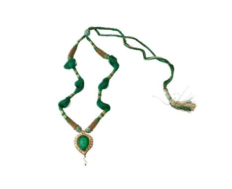 
	
		AN INDIAN DIAMOND, CARVED STONE AND JAIPUR ENAMEL KAIRI PENDANT
		The pendant with a central green foil backed carved st