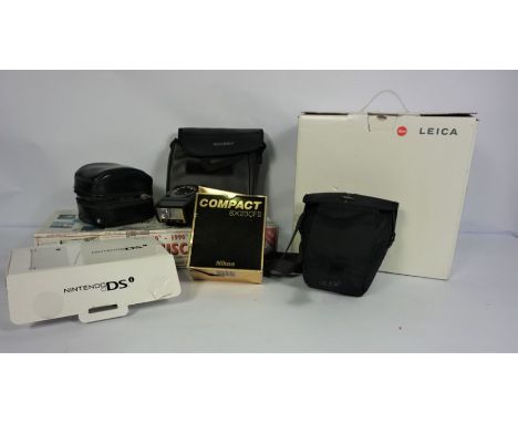 A Leica Pradovit P150 projector; together with assorted items including a LUMIX F228 camera and a Nintendo DS (cased)