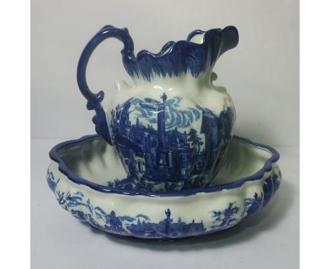 A large Victorian style wash basin and ewer with blue and white classical decoration, bowl 40cm wide; together with a pair of