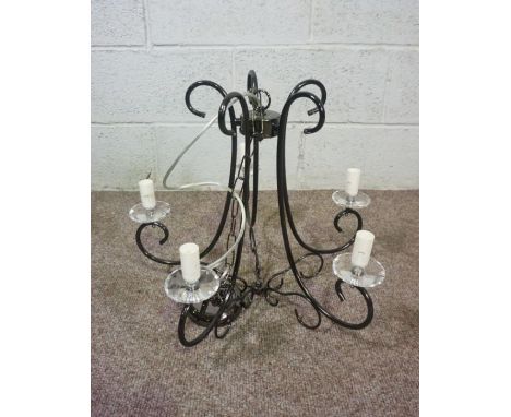 Three modern pendant light fittings, including a chandelier with five scroll arms; a suspended light fitting with multiple dr