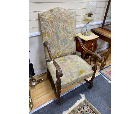 A pair of Louis XIII style walnut tapestry open armchairs, width 65cm, depth 62cm, height 116cm