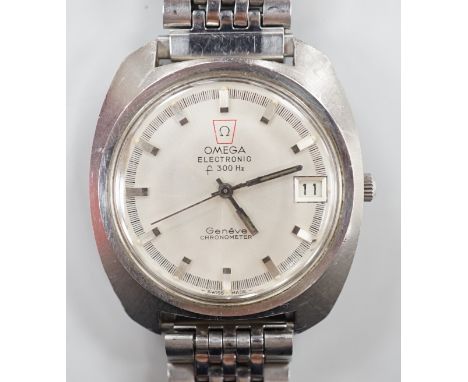A gentleman's 1970's? stainless steel Omega Electronic wrist watch, on associated steel bracelet, a case diameter 38mm, box n