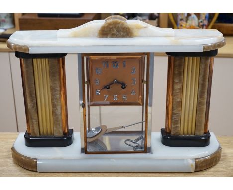 An Art Deco chrome, copper, brass and alabaster four glass mantel clock, 54cms wide