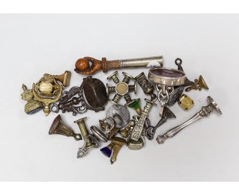 A group of twenty-five steel, gilt metal or nickel fob or desk seals, mostly 19th-century, including a steel swivel seal, a s