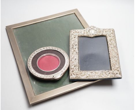 A large 1920's engine turned silver mounted rectangular photograph frame, Birmingham, 1928, 33.2cm and two other silver mount