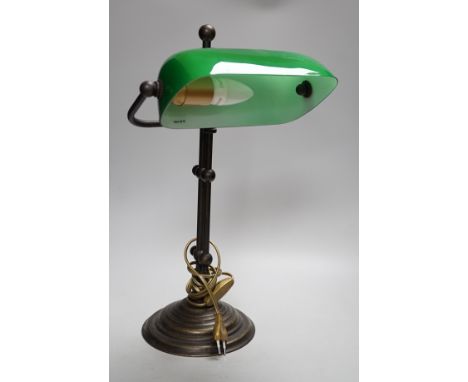 A green glass and brass student lamp, 48cms high