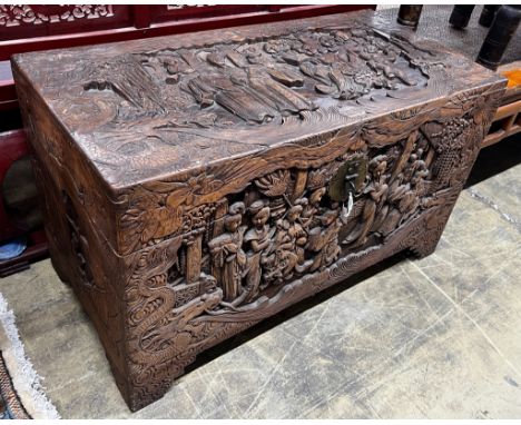 A Chinese carved camphorwood trunk, length 104cm, depth 52cm, height 61cm