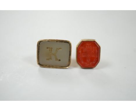 A 19th century yellow metal overlaid and white carnelian set fob seal, the matrix carved with the letter K, 27mm and a 1970's