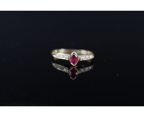 An 18ct gold red and white stone set ring (misshapen), approx 2.3g
