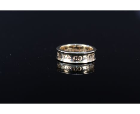 An 18ct gold Tiffany &amp; Co 1837 band ring, size N, approx 8g