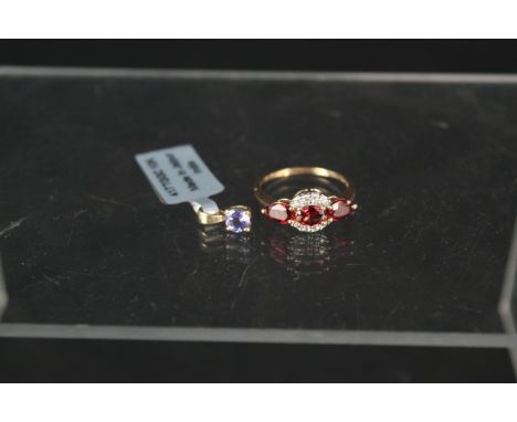 A 9ct gold spinel and zircon set ring, size P together with a small 9ct gold tanzanite pendant, with certificates