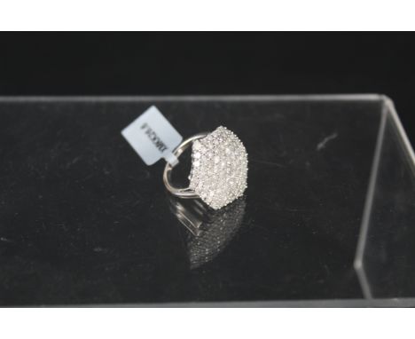 A silver diamond set cluster ring, total diamond weight 4ct, with certificate, size L