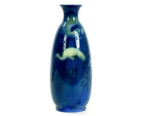 A ROYAL WORCESTER SABRINA WARE VASE PAINTED BY ALBERT SHUCK, SIGNED WITH INITIALS, WITH AN IBIS IN A MOONLIT LANDSCAPE, 14CM 