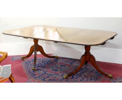 A MAHOGANY TWIN PILLAR DINING TABLE, BASICALLY 19TH C 196CM X 122CM 