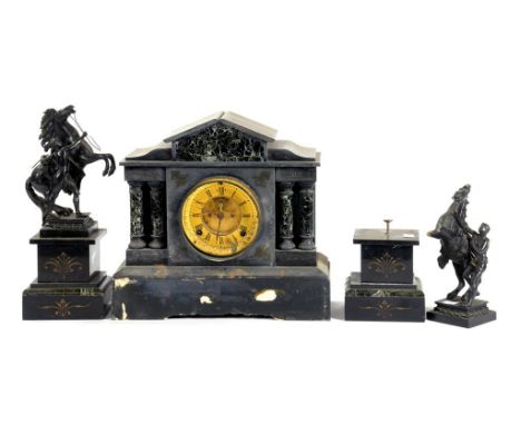 A FRENCH SLATE AND VERDE ANTICO MARBLE CLOCK GARNITURE, THE ARCHITECTURAL SHAPED CLOCK FLANKED BY A PAIR OF SPELTER EQUESTRIA