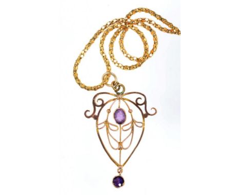 AN AMETHYST SET GOLD OPENWORK PENDANT AND A LATER GOLD NECKLET, MARKED 9CT OR 375 RESPECTIVELY, 5.3G