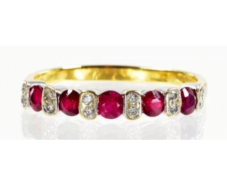 A RUBY AND DIAMOND RING IN 18CT GOLD LONDON 2002, 2.9G