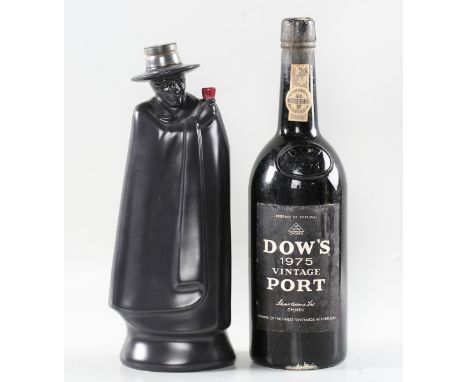 Dow's 1975 vintage port (1), Sandeman Don decanter, filled with Partner's port, boxed (1).Buyer’s Premium 29.4% (including VA