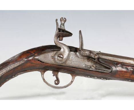 An early 19th century Continental flintlock pistol by Giuseppe Merli, with circular barrel, barrel length 26.5cm, full-stocke