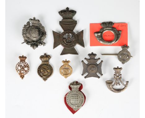 A Victorian helmet plate badge for the King's Royal Rifle Corps (excavated condition), together with a small collection of ot