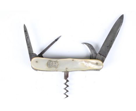 A mid-19th century multi-tool pocket knife by Henry Boker, with various fold-out blades and tools, the main blade stamped wit
