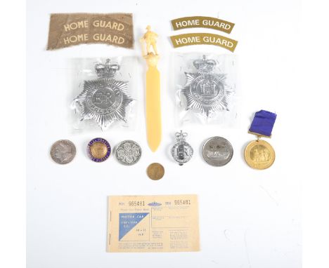 A small group of police badges and helmet plates, including post-1952 Suffolk Constabulary, post-1952 Sussex Constabulary and