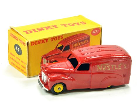 Dinky No. 471 Austin Nestle's Van with red body, silver trim and yellow ridged hubs. E in G Box.