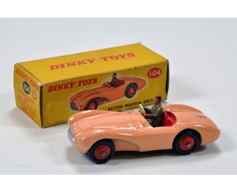 Dinky No. 104 Aston Martin DB3S with pink body, red interior and ridged hubs. E to NM in VG Box.