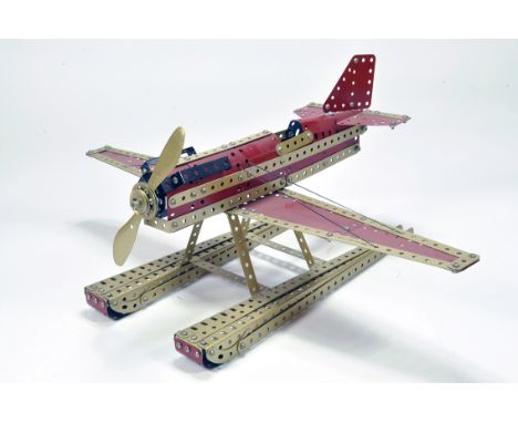 An exceptionally well constructed Single Engine Meccano Aircraft in Red / Gold. Brilliant piece. 