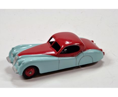 Dinky No. 157 Jaguar XK120 Coupe in two-tone turquoise/cerise. Lovely example is E to NM.