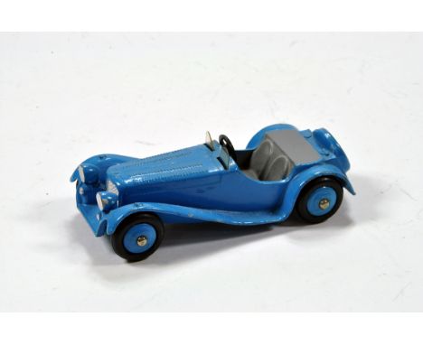 Dinky No. 38f Jaguar SS with blue body and grey interior plus blue hubs. Generally VG to E.