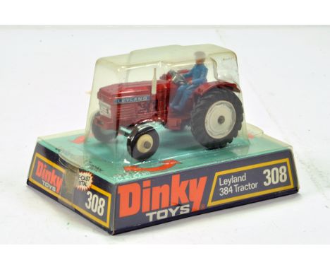 Dinky No. 308 Leyland 384 Tractor in Metallic Red with driver. E to NM in VG to E Box.