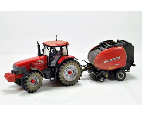 Universal Hobbies 1/32 Farm Issue comprising McCormick ZTX Tractor and MF 720V Baler. Models have been converted / weathered 