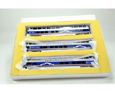 Bachmann OO Gauge comprising McKinley Explorer Passenger Car trio. NM in Box.