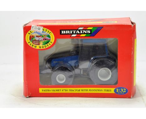 Britains 1/32 Farm Issue comprising Valtra 8750 Tractor with flotation tyres. NM to M in Box.
