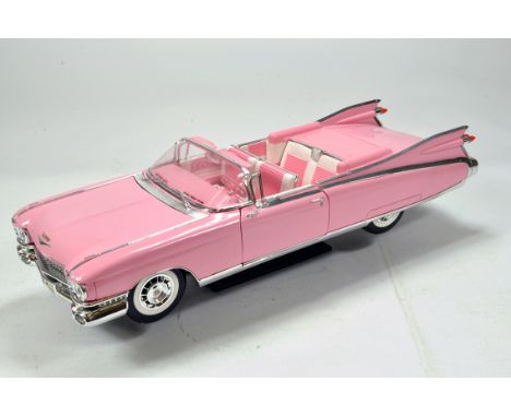 Maisto Premium 1/12 scale diecast issue comprising 1959 Eldorado Biarritz Pink Cadillac. Fine model is NM with box.