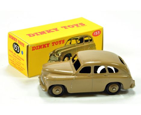 Dinky No. 40E/153 Standard Vanguard with tan body and ridged hubs. E in Repro box.