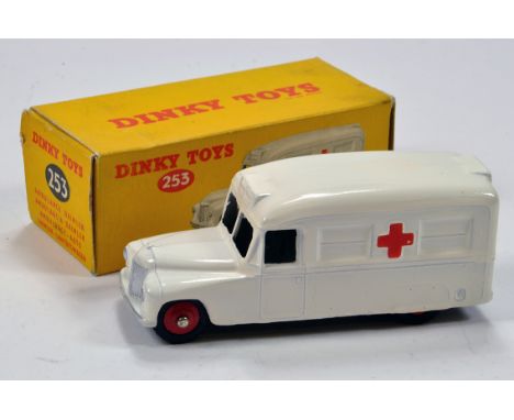 Dinky No. 253 Daimler Ambulance with white body and red ridged hubs. E to NM in VG to E box.