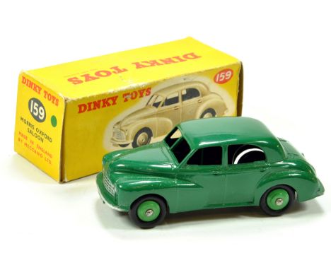 Dinky No. 159 (40g) Morris Oxford Saloon with green body and green ridged hubs. E to NM in G to VG Box.