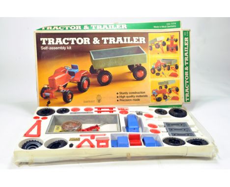 Herbant (West Germany) Plastic and Metal Issue Construction Kit of a Tractor and Trailer. Appears complete. Rare.