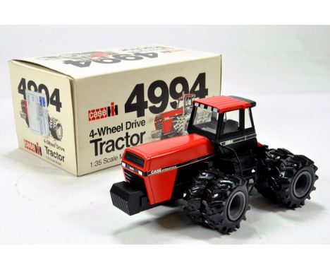 Conrad 1/35 Farm Issue comprising Case IH 4994 Tractor. NM to M in Box.